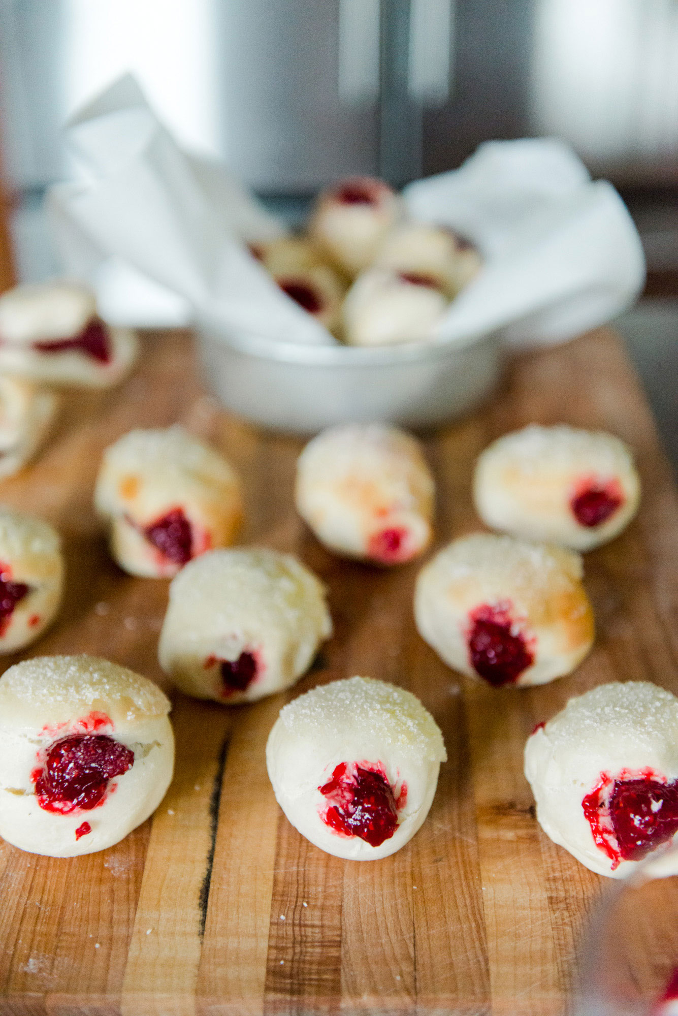 Raspberry filled air fryer donuts with lemon sugar topping