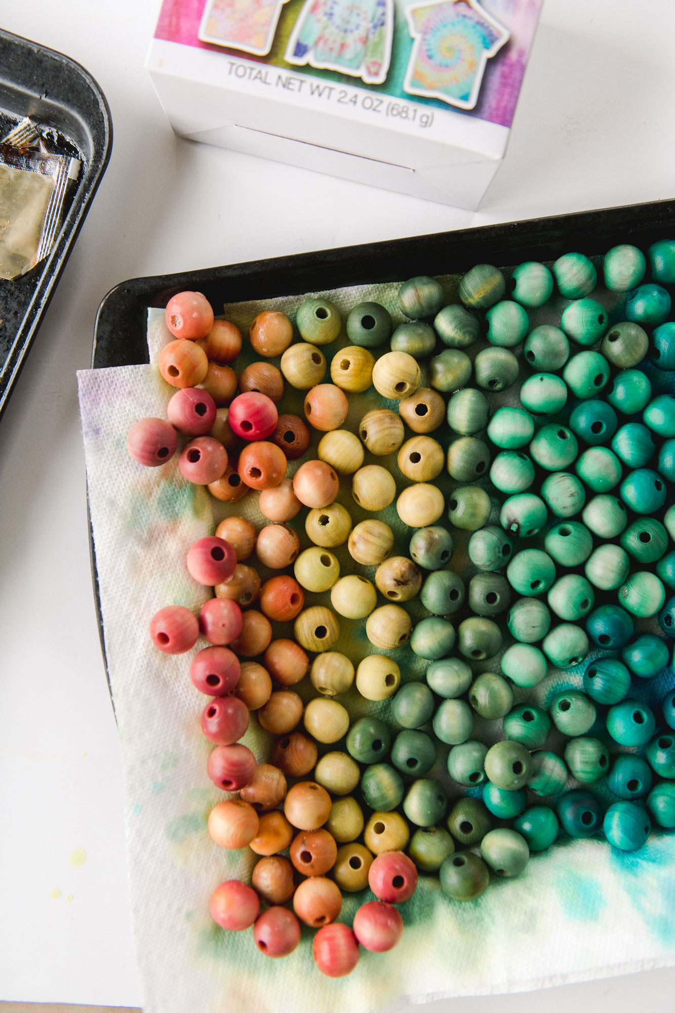 Tie dyed wooden beads + using them to make a colorful bead garland! :) 