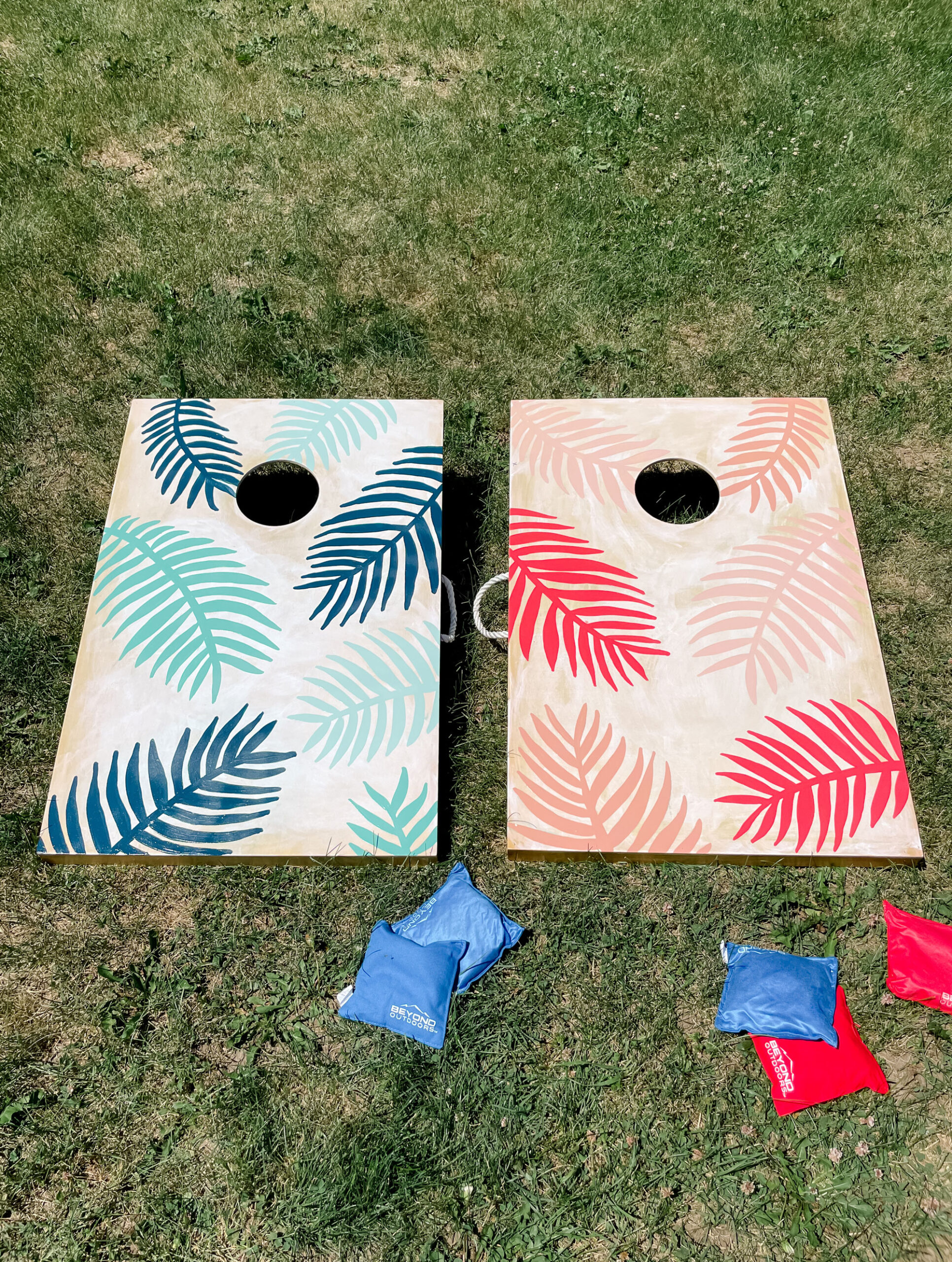 How to paint custom bag boards, palm leaf bag boards, 4th of july bag boards, colorful custom bag boards, painted bag boards DIY