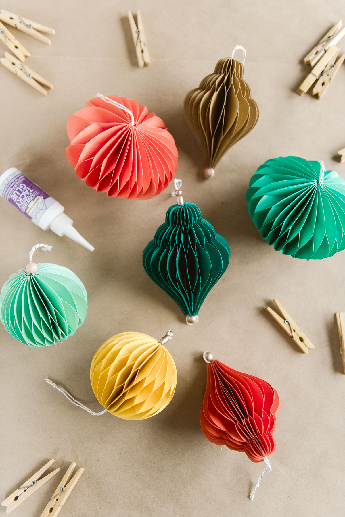 How to make honeycomb ornaments out of paper, Honeycomb ornament DIY, how to make paper ornaments, honeycomb ornament pattern, handmade christmas decorations, christmas decor ideas, colorful christmas decor